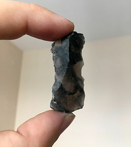 An obsidian stone tool