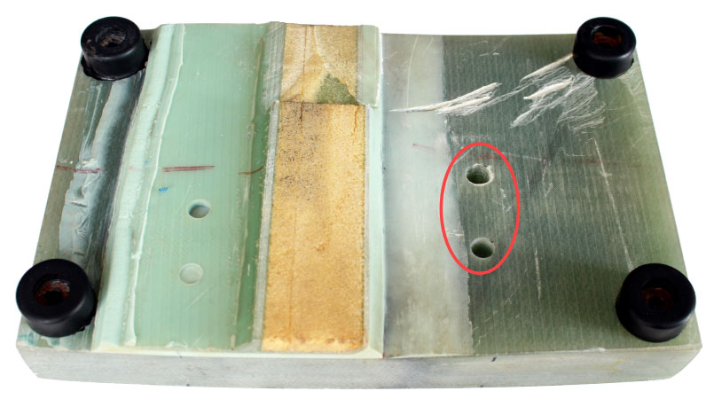 Sample section of a wind turbine blade with manufactured flaws